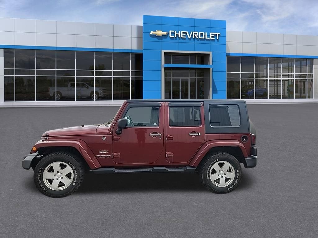 Used 2010 Jeep Wrangler Unlimited Sahara with VIN 1J4BA5H13AL138156 for sale in Hastings, Minnesota